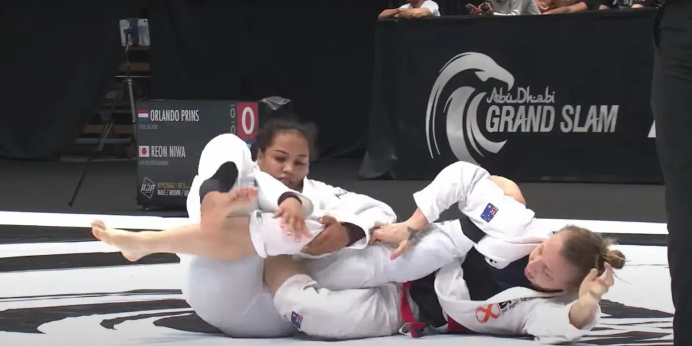 Open Sparring competitors grappling at a jiu-jitsu tournament